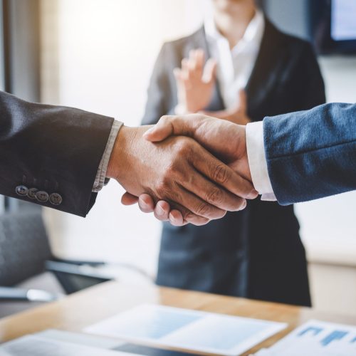 finishing-up-a-meeting-business-shaking-hands-a.original
